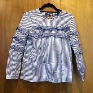 Striped shirt with ruffles and keyhole back